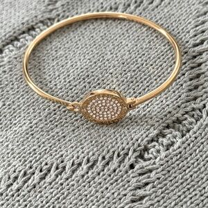 Gold Michael kors bangle with cubic zirconia
